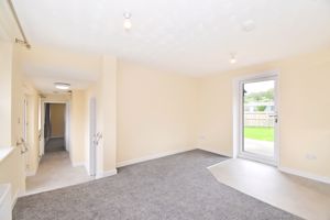 Open plan living room and hallway- click for photo gallery